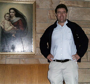 Steve next to painting of Madonna and Child