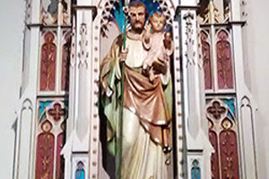 File Photo of Statue of Saint Joseph Holding the Infant Jesus
