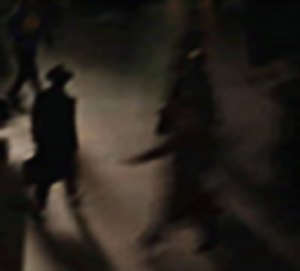 File Artist's Image of Shadowy Figures of Men in Dark Coats and Hats