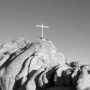 Cross Atop Rocky Cliff