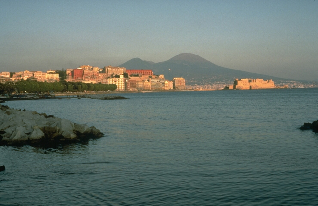 File Photo of Naples, Italy, Coastline with Mount Vesuvius in Background, adapted from usgs.gov image with photo credit t0 Dan Dzurisin