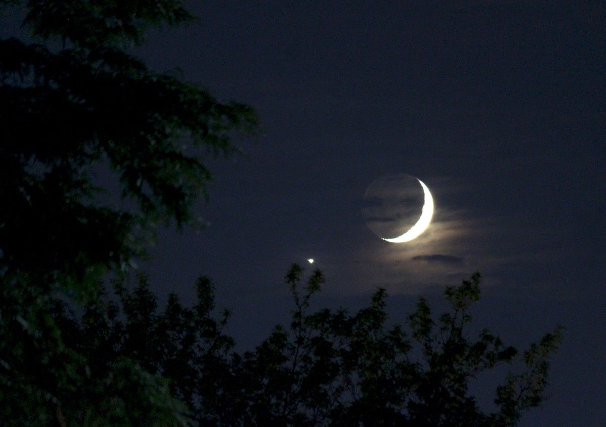 File Photo of Moon and Venus in Night Sky adapted from nasa.gov image with credit to Bill Dunford and NASA